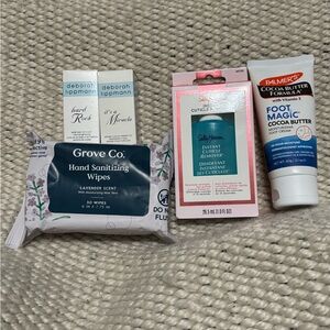5 brand new mani/pedi items. Hand wipes, base/top coat, cuticle oil, & more.
